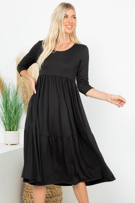 A Joy Forever Tiered Midi Dress in Black - Curvy